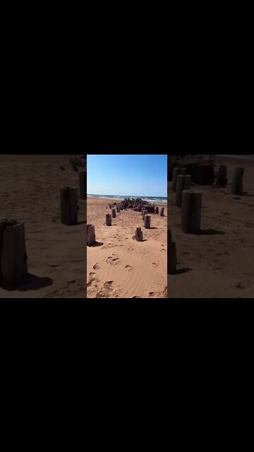 An old destroyed dock at the beach