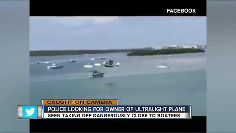 CAUGHT ON CAMERA: Small plane illegally flies dangerously close to boats at busy tourist attraction