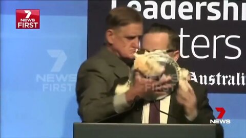 Man smashes a pie into an airline CEO's face!