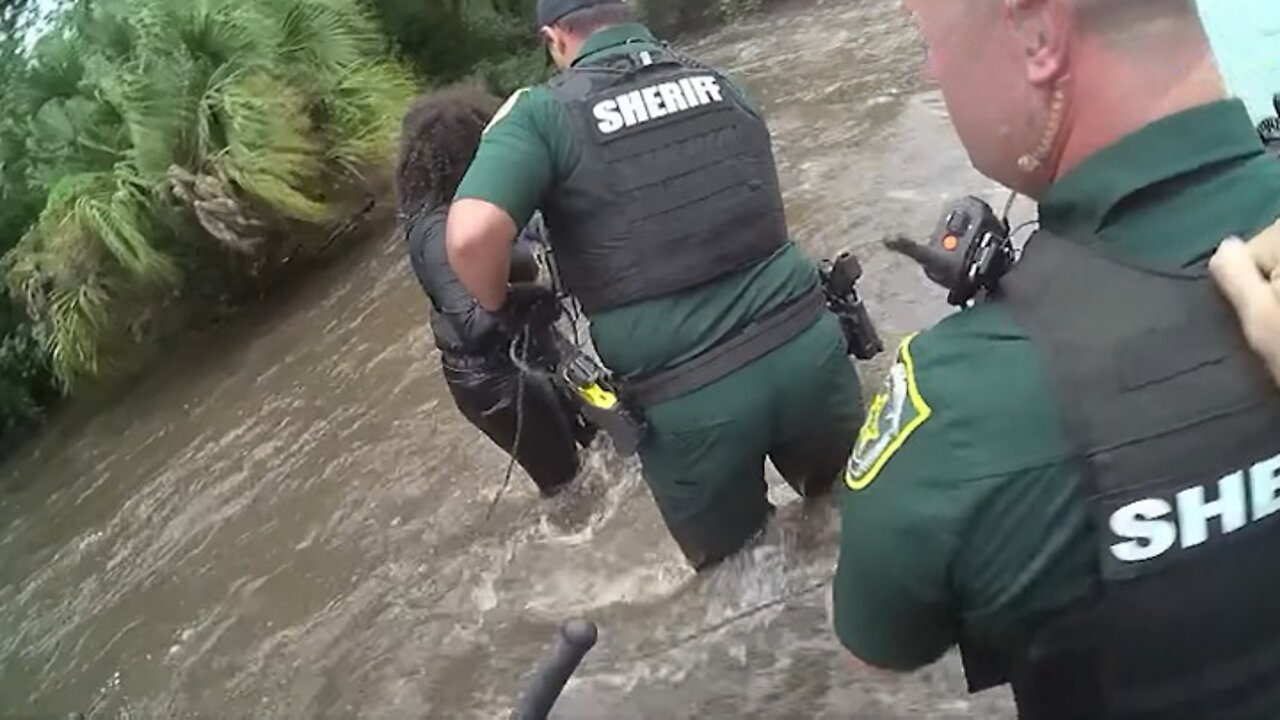 Sheriff's deputies rescue woman trapped in surging waters