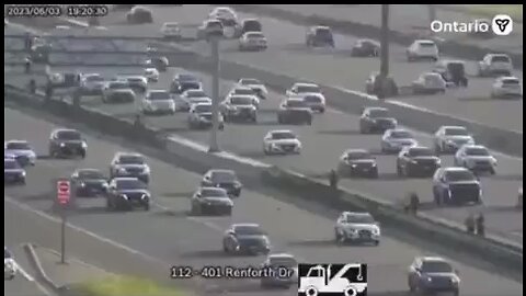 Pedestrians Walking On Highway 401