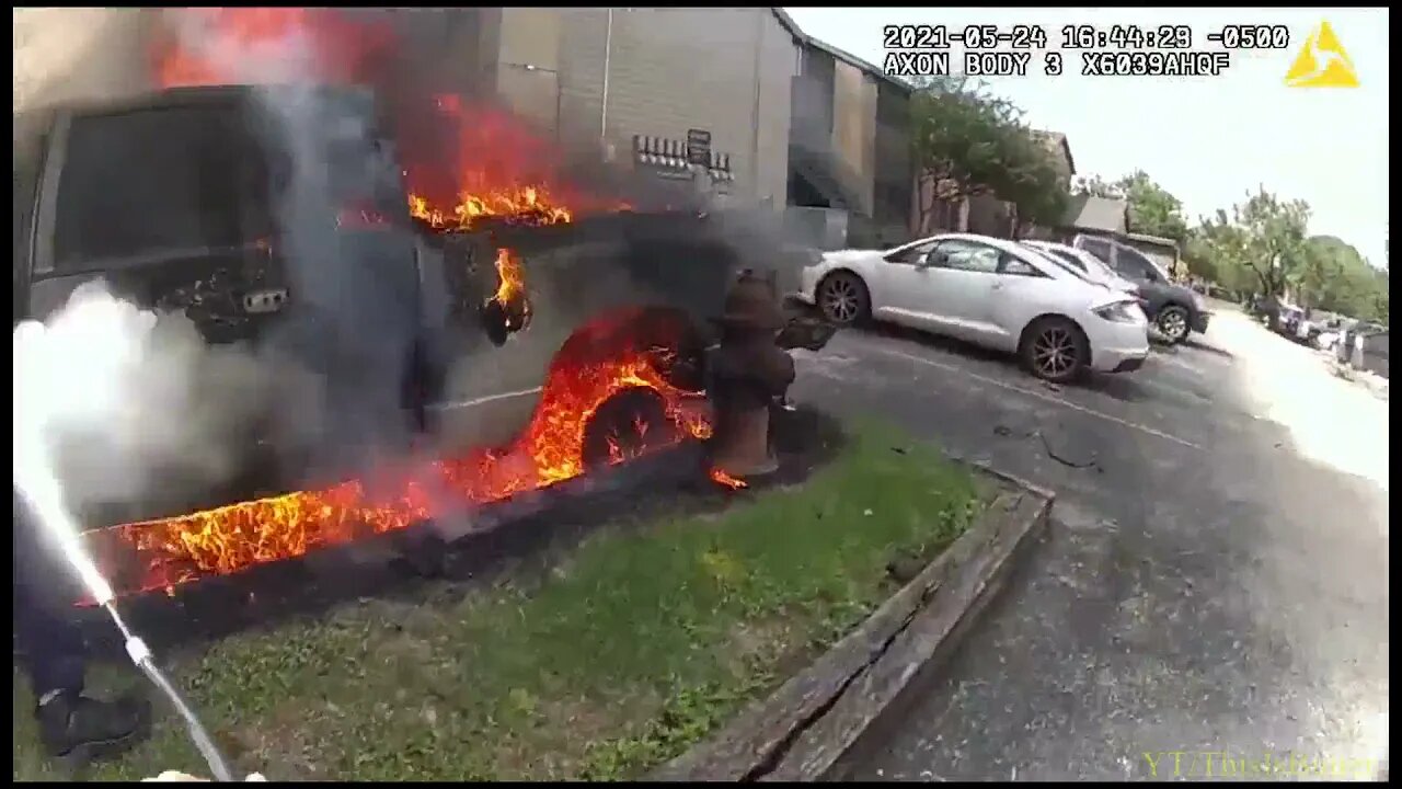 Dramatic video shows first responders pulling man from car during fire