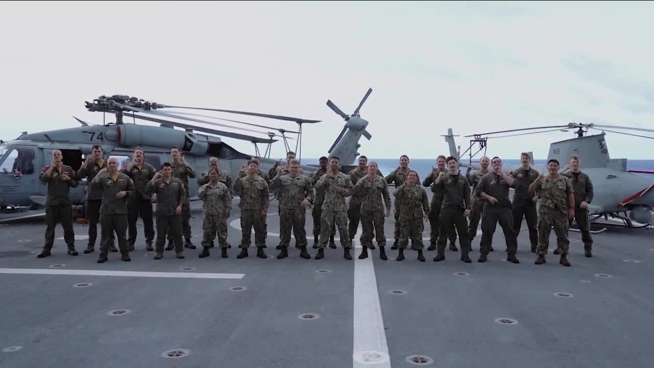 Navy sailor gets ship crew to sign 'happy birthday' to his son in ASL