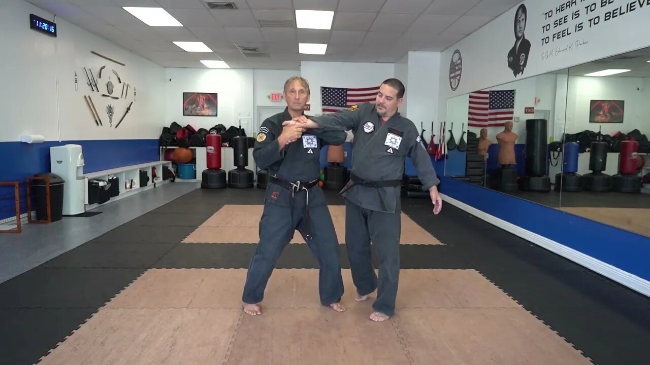 Executing the American Kenpo technique Broken Gift