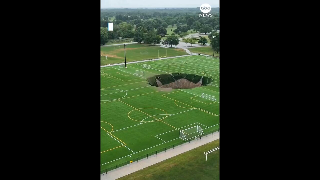 Massive sinkhole, approximately 100 feet wide, has emerged across a sports field in Alton, Illinois