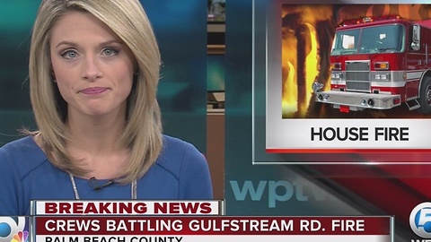 Crews battling house fire in Lake Worth