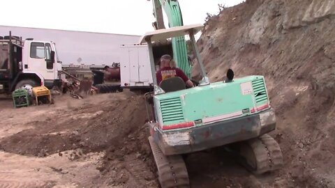 Yanmar YB 451 Working On Top Of A Berm