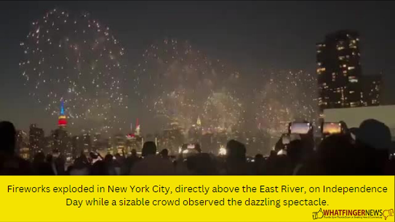 Fireworks exploded in New York City, directly above the East River, on Independence Day