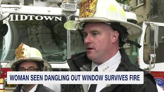 Firefighters Rescue Woman Dangling From 20th-Story Window