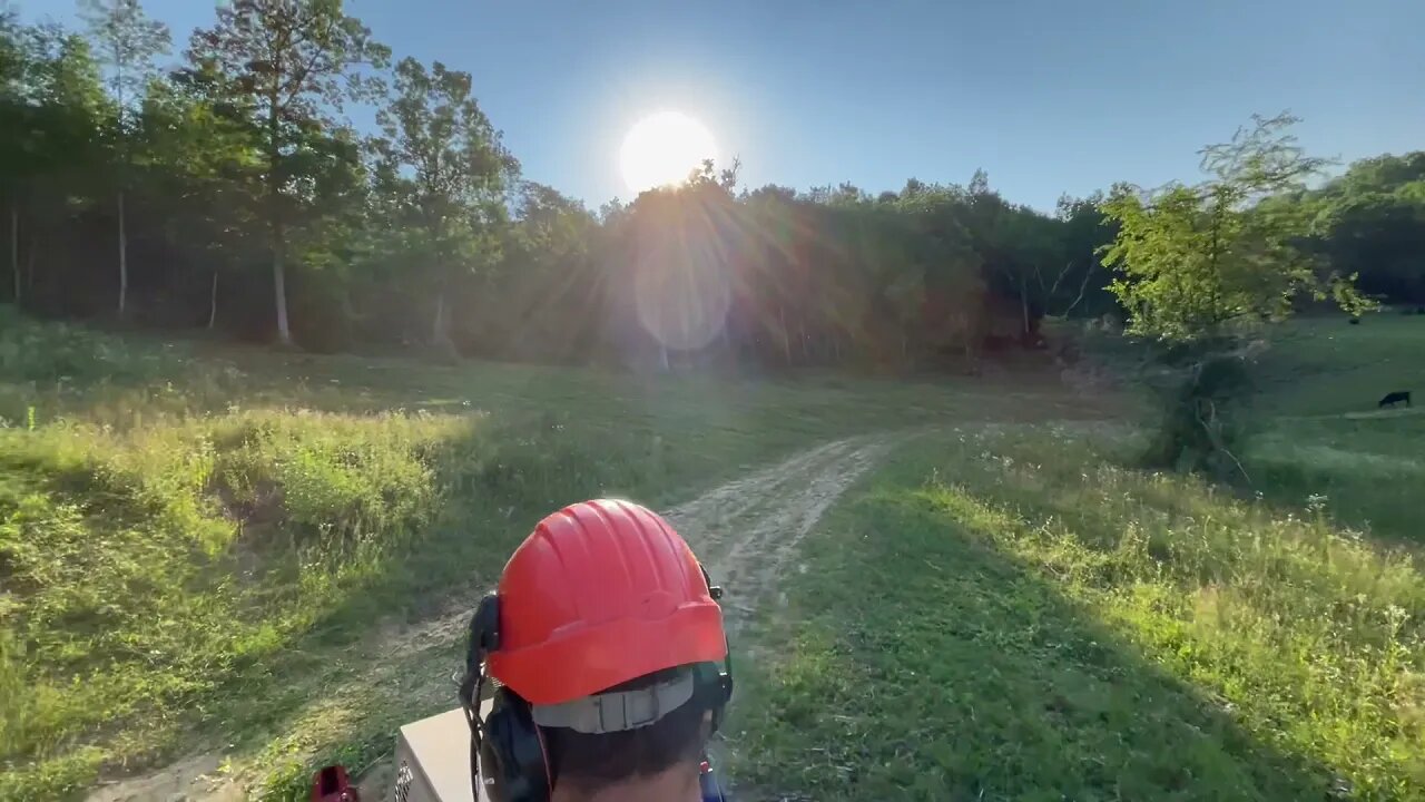 Ventrac 4500Y diesel mowing a pasture on a small slope.