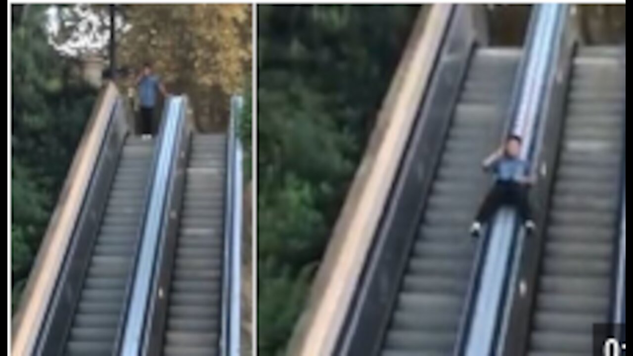 Guy Slides Down Escalator