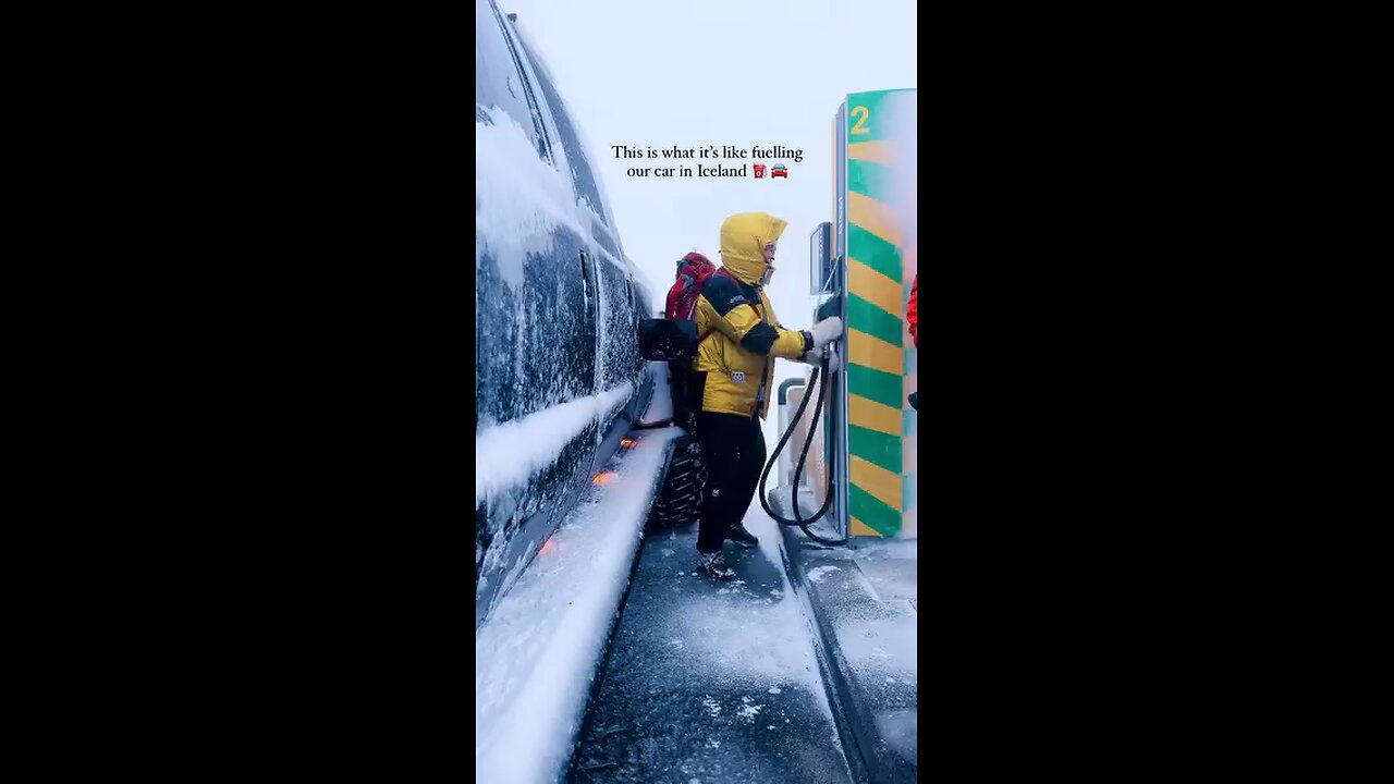 "The Heavy Winter In Iceland Petrol Pump At Road Covered By Car With Smoge Follow For More"...!!