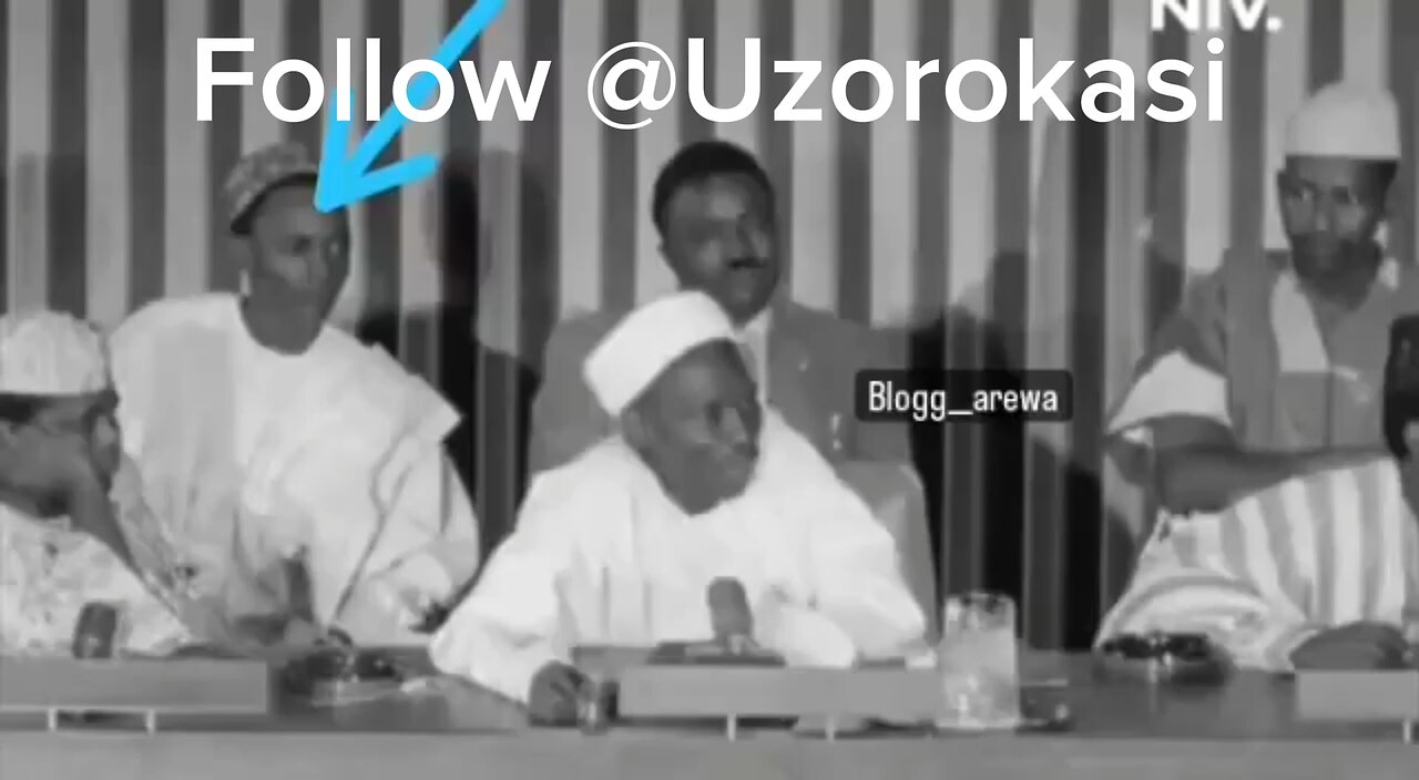 Who was that smoking right behind the Prime Minister, Tafawa Balewa