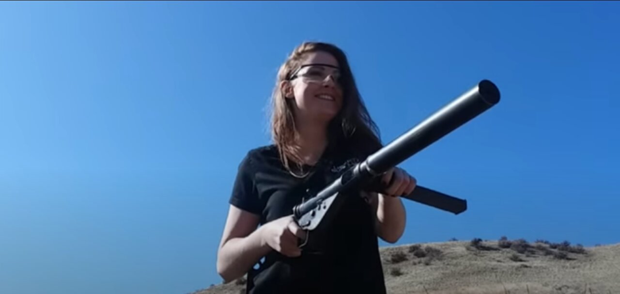 Melanie having fun with the silenced STEN gun!