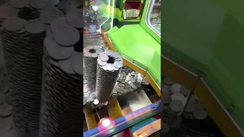 Have you played this coin pusher game ?