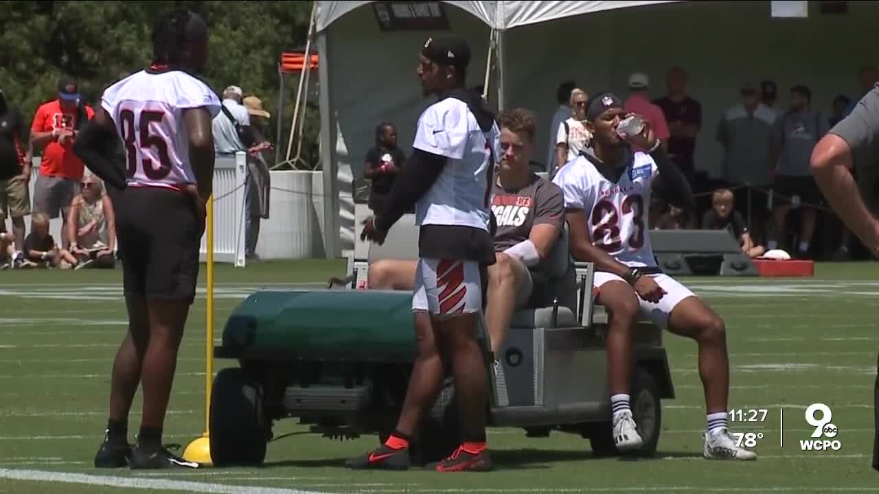 Burrow in a golf cart: Bengals quarterback joins team at training camp