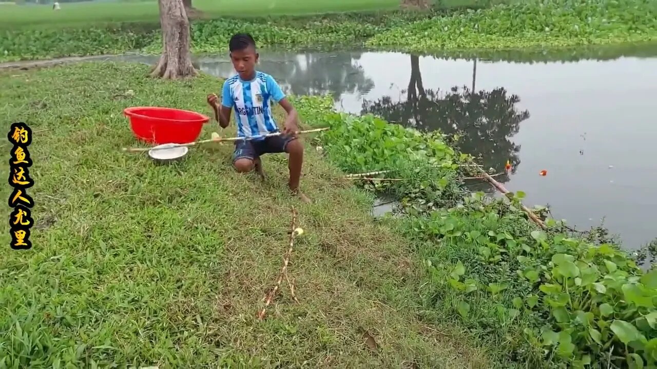 The little boy went fishing by the river and brought home big carp to improve his food +4