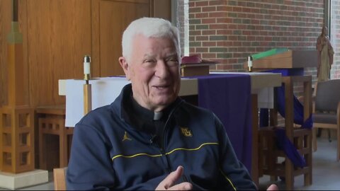 Father John Laurance plays a vital role off the court for Marquette
