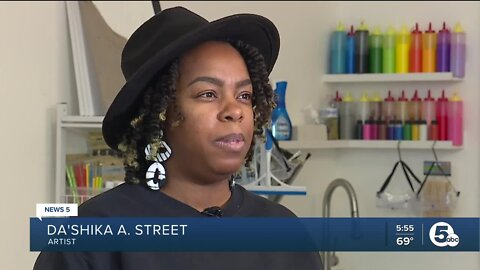 Artists create murals to cover vandalism caused during Akron protests