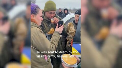 Russian soldier surrenders in tears