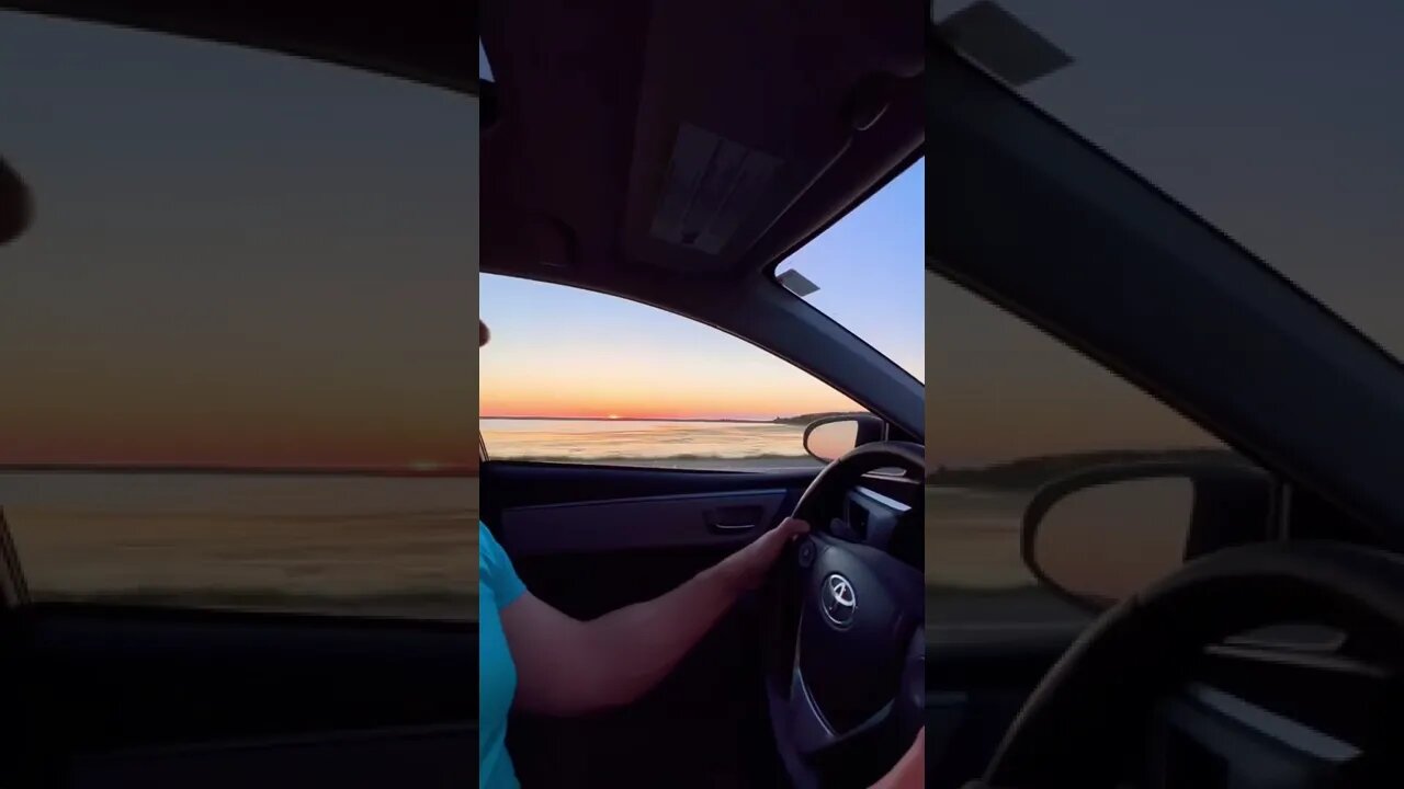 Driving by a Sunset near Confederation Bridge