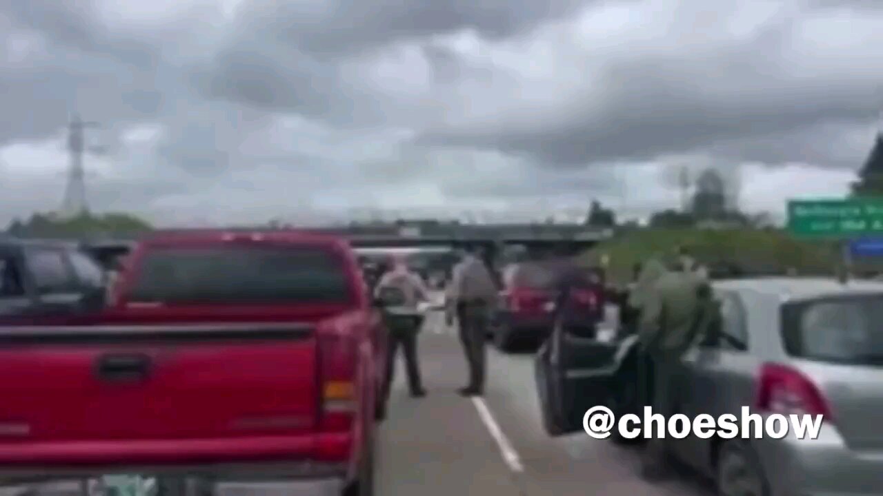 Hamas supporters block a highway in Oregon as part of their nationwide attack today