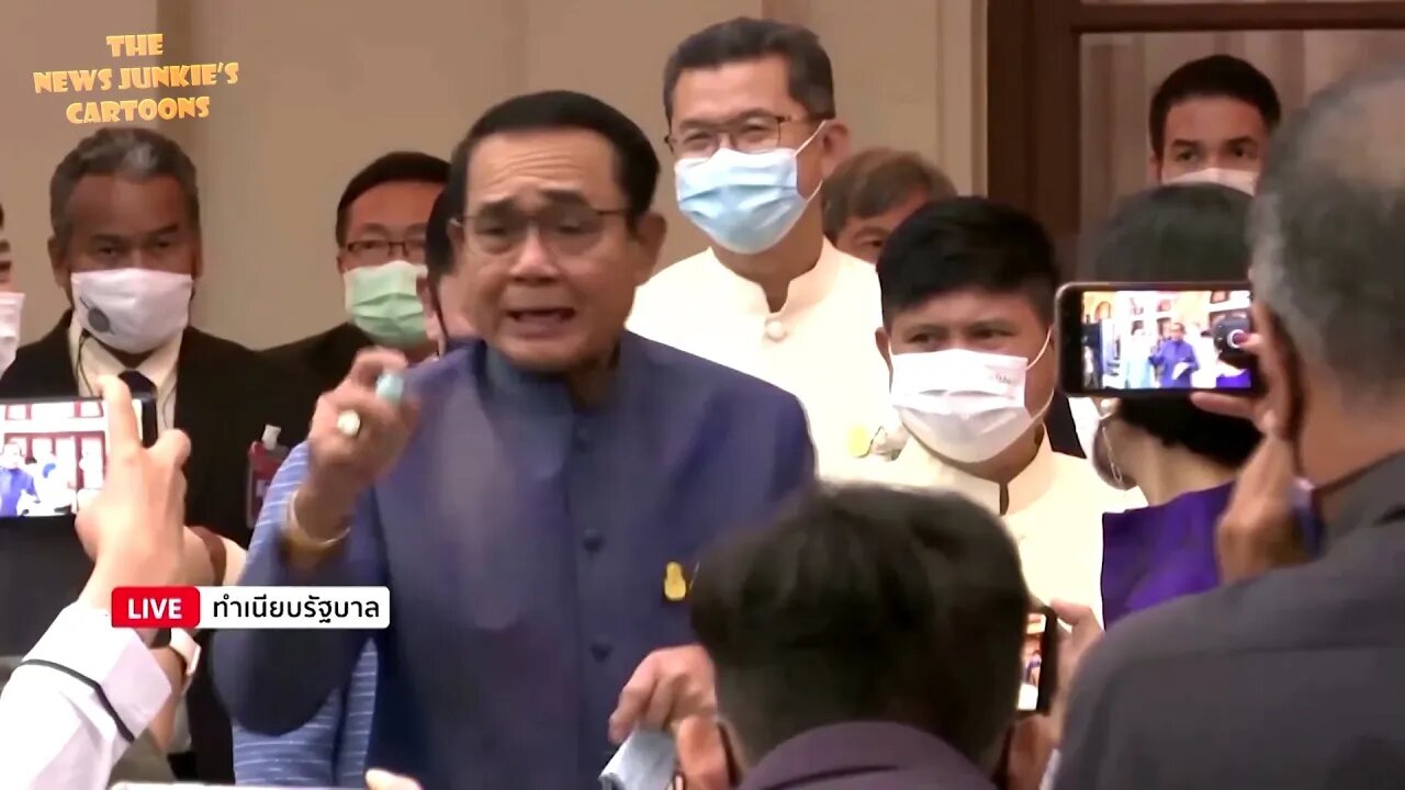 Thai Prime Minister sprays journalists with aerosol to avoid taking questions.