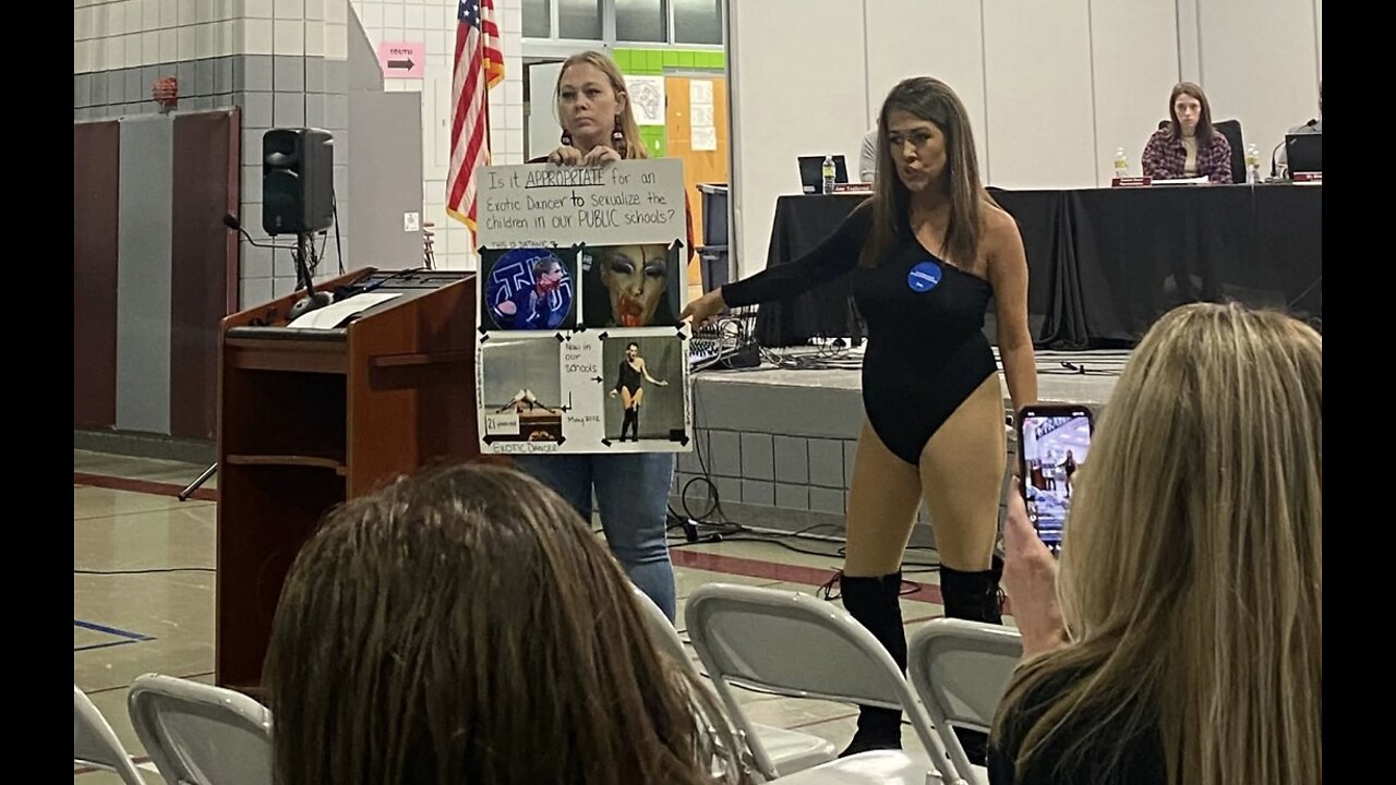 Outrage Mother Dresses as a Drag Queen During School Board Meeting to Protest