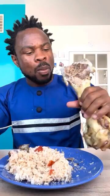 Dude is eating bones and rice