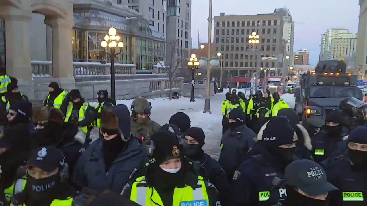 Freedom Convoy 2022 -Feb18th - Holding the Line. Facing the Riot Police and Horses.