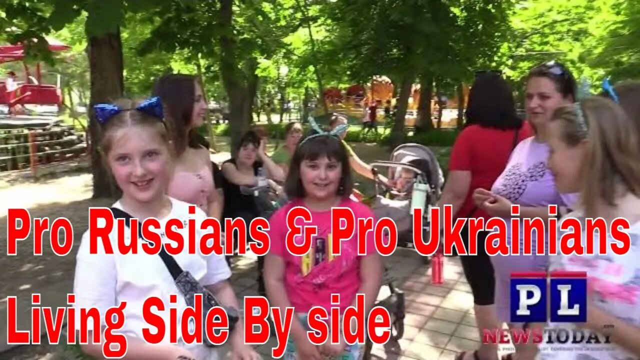 Pro Russia & Pro Ukraine People Living together In The Warzone