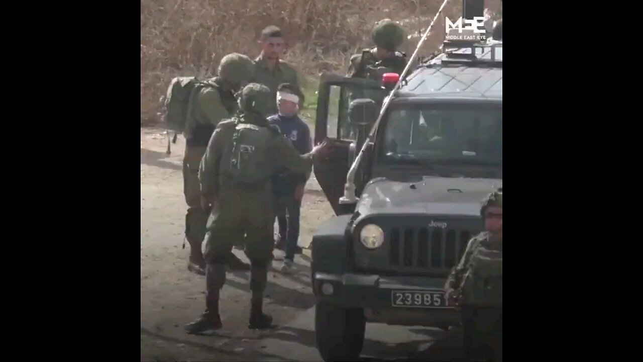 Israeli media would NEVER show you THIS! Blinded folded a Palestinian child while in handcuffs.