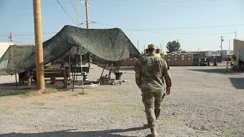 Soldier provides aid and security