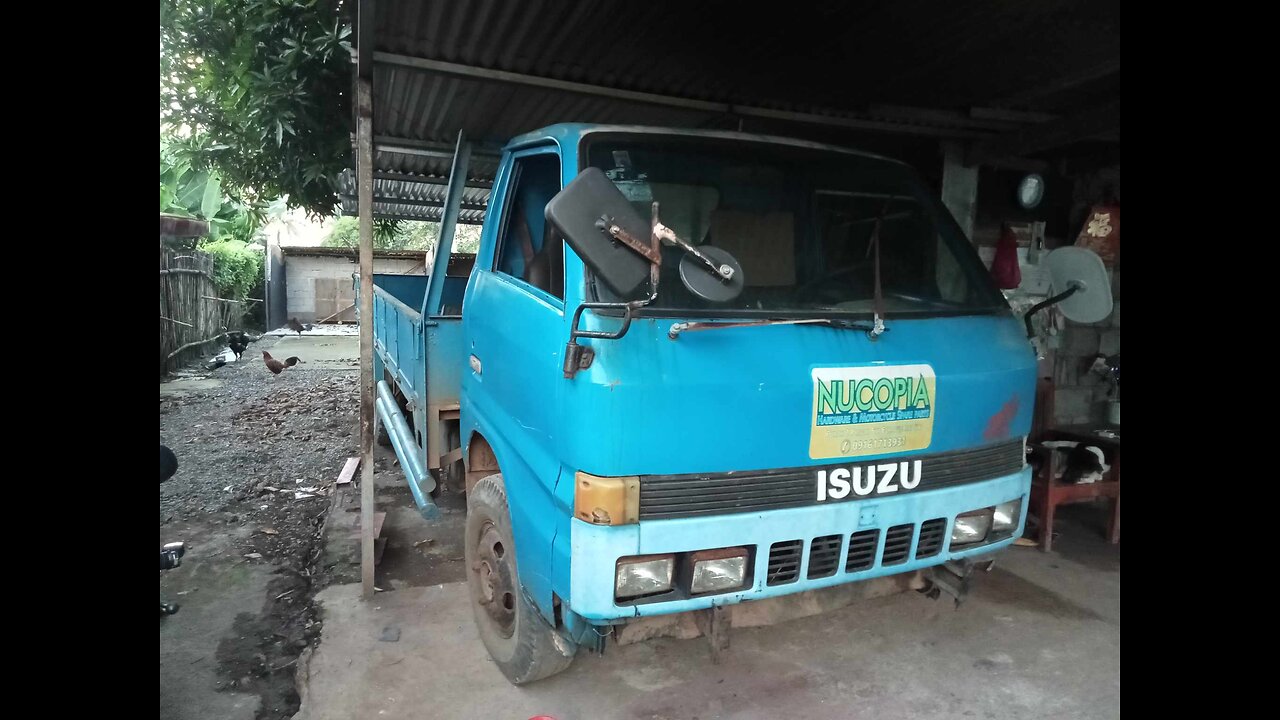 Izuzu Elf truck in for repairs