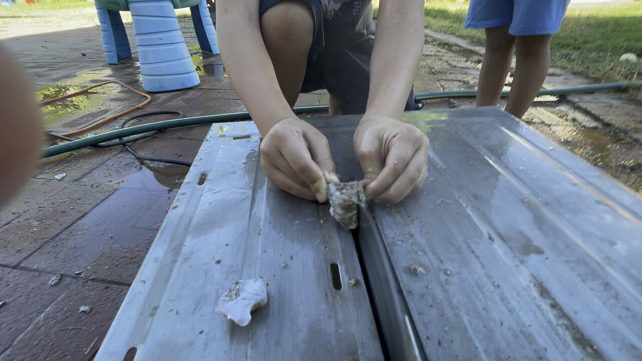 Teaching my kids to cut rocks