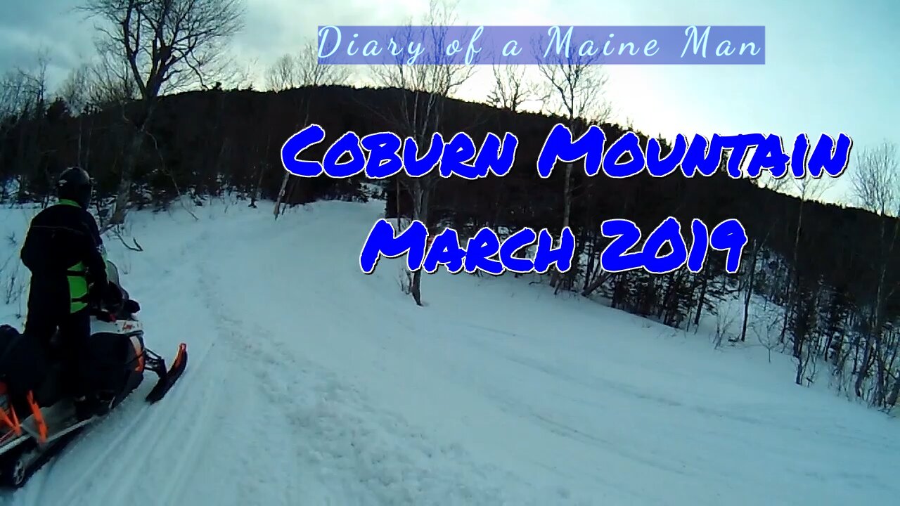 Snowmobiling up Coburn Mountain, Maine