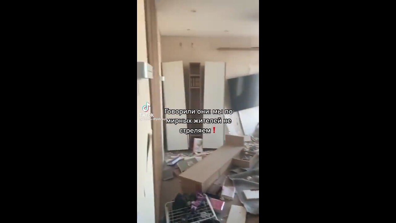 A mother shows her home after being hit by a #Russian missile attack