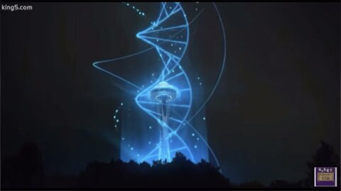 Vaccine syringe and DNA ManIpulated was shown off by Satanist globalists on New Year’s Eve 2021