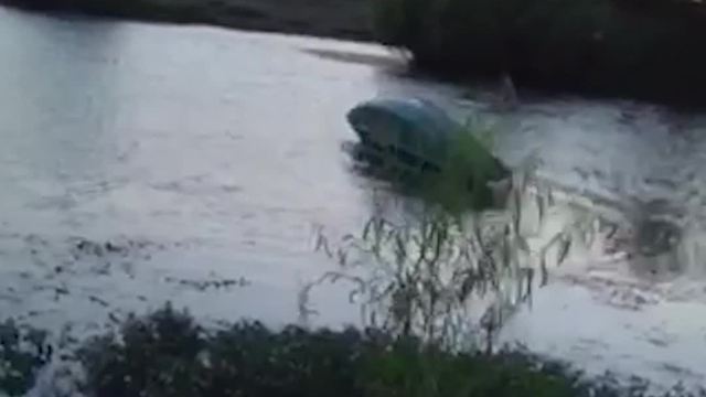 Lady Flips A Canoe