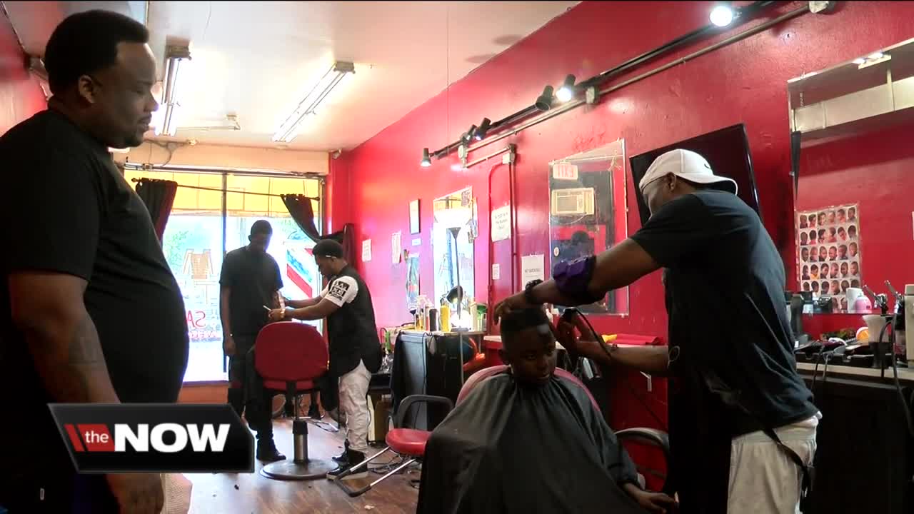 Local barbershops gets kids ready for first day of school with new haircuts