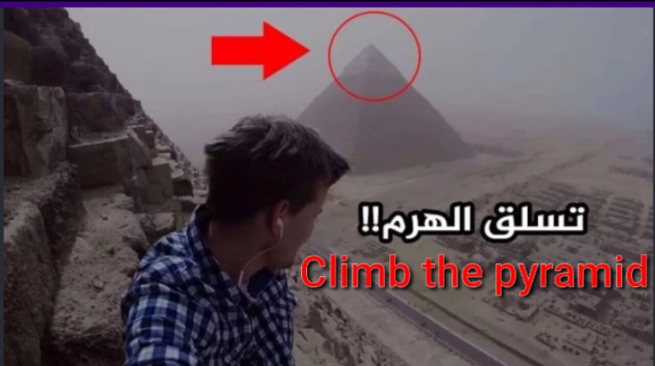 A young man climbs the pyramids of Giza in Egypt