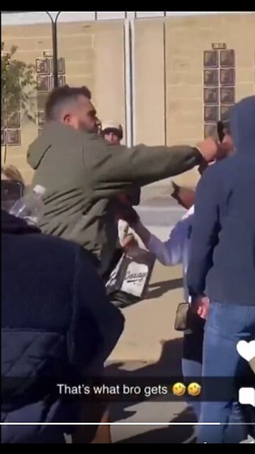NEW: Jason Kelce, brother of Travis Kelce, grabs a man's phone and smashes it on the ground