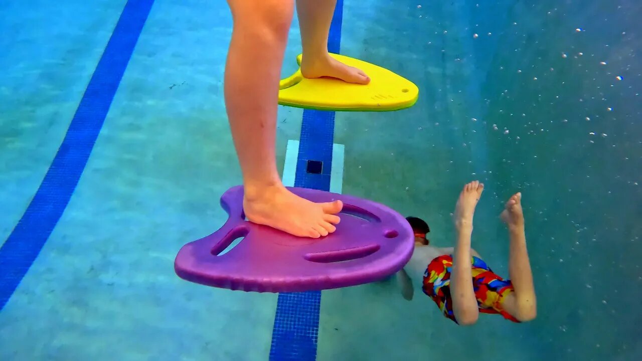 You have to see her fearless attempt handstands on two kickboards underwater