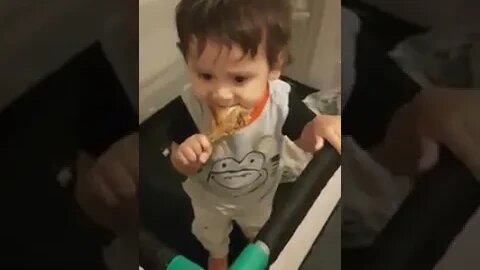 Little sweetheart baby boy eats chicken while watching nursery rhymes #cutebaby