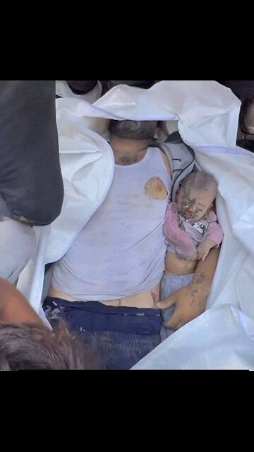 The father tried his best to save his little son in Gaza Palestine.