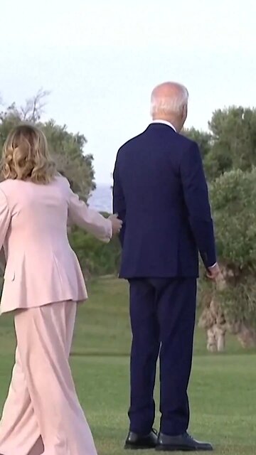 The ITALIAN PRIME MINISTER had to step in and stop Joe Biden from wandering off