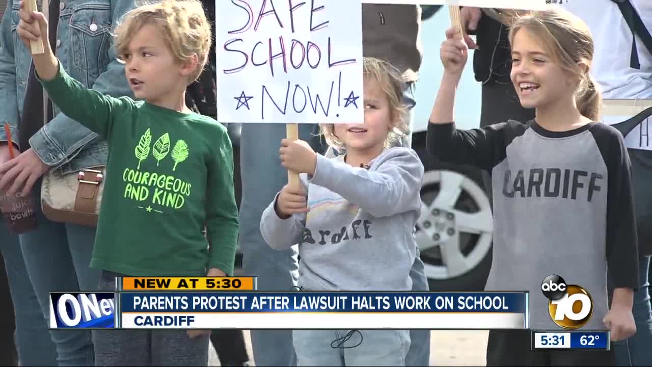 Parents protest over stalled construction