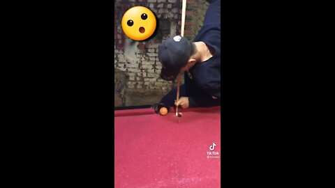 Watch the young man’s skill in playing billiards😮