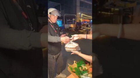Beautiful Chinese Girl Preparing Fast Food To Go