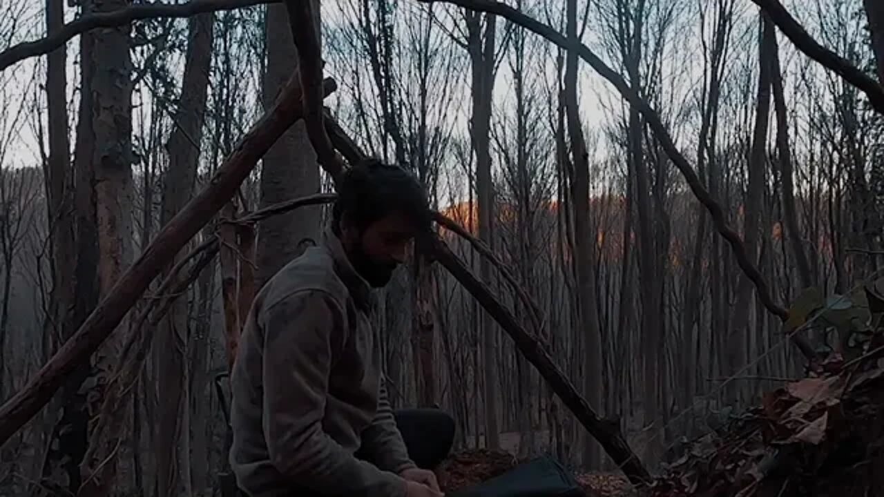 Building complete and warm survival shelter~16
